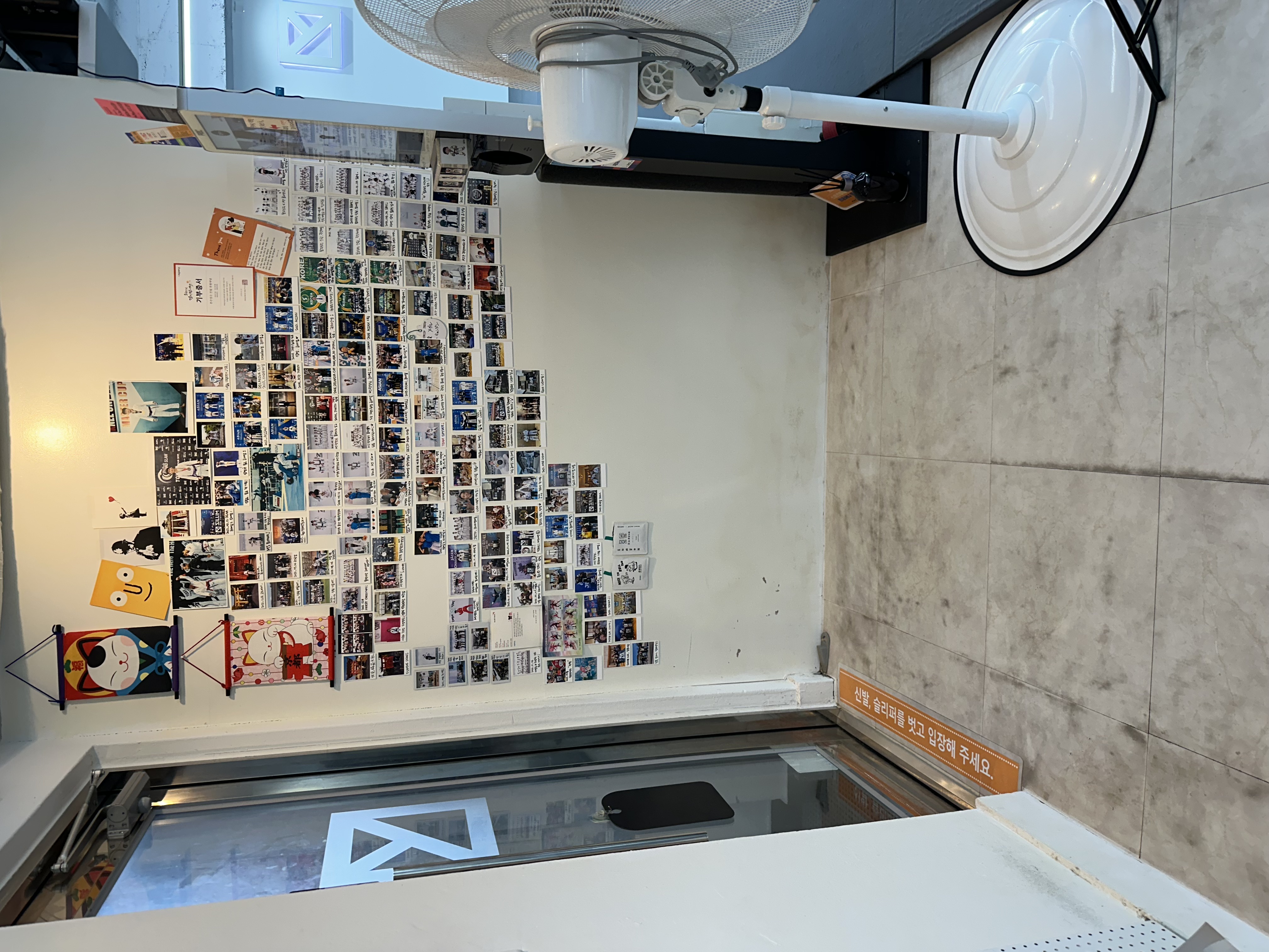 Jiu-Jitsu gym, board, and polaroid photos